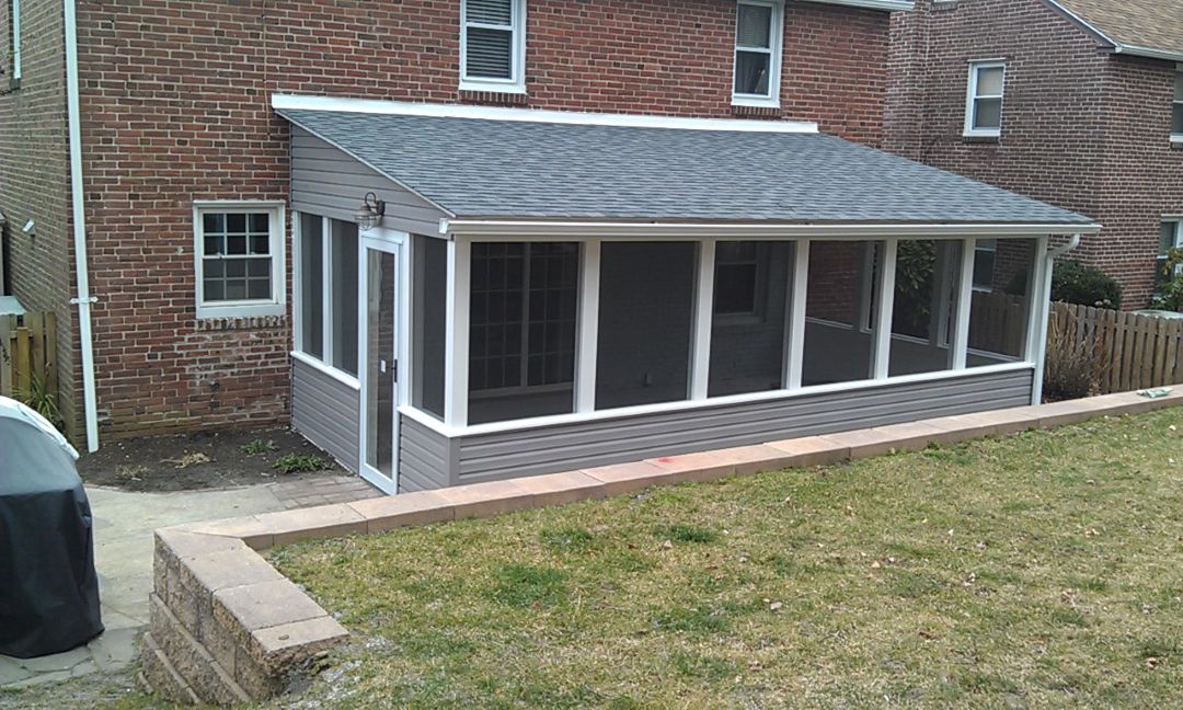 Screened porch addition on the rear of a home in Ardmore