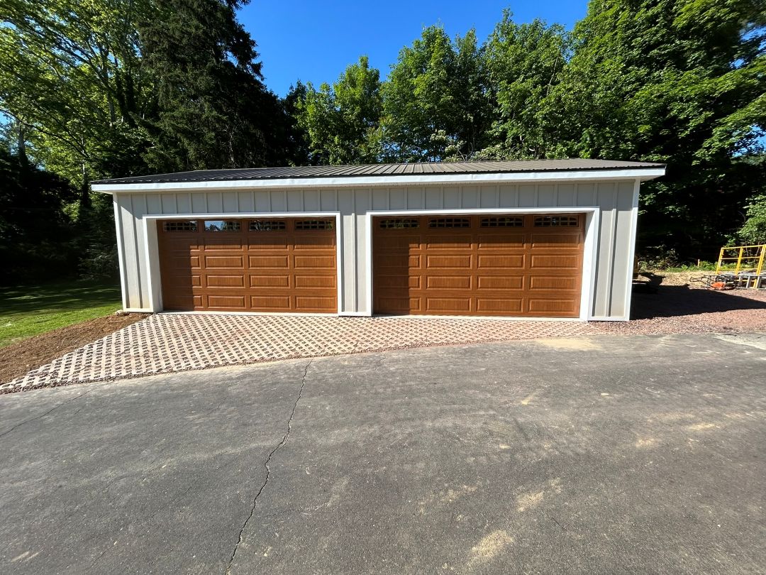 Detached garage with two overhead doors